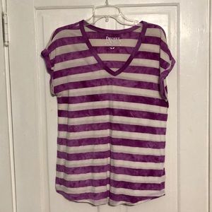 Short sleeve purple and white striped shirt.